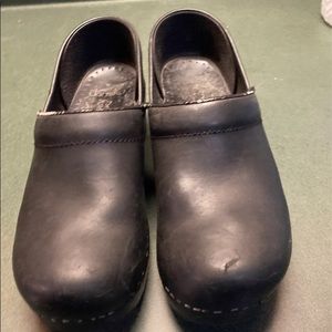 Dansko black leather clogs